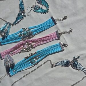 Odds And Ends. Angel Wing  Necklaces, Rings And 3 Bracelets.
